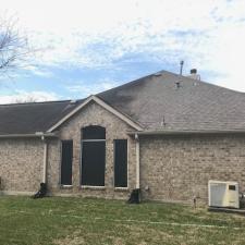 Soft wash roof cleaning